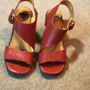 John Fluevog brick colored leather sandals worn once. Excellent condition.